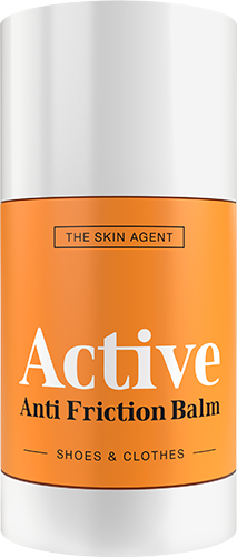 En vit och orange stam med texten 'Active Anti Friction Balm', används för skor och kläder.