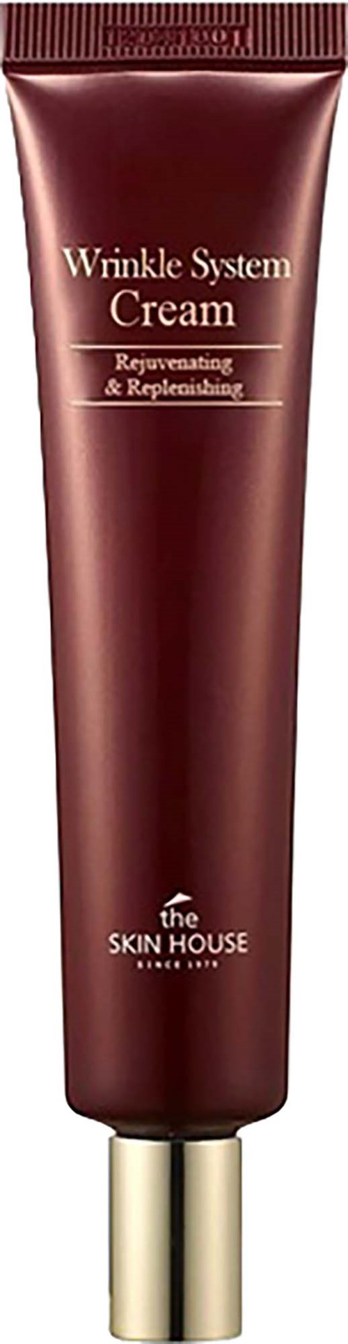 Een bruine tube met gouden deksel, gelabeld Wrinkle System Cream door The Skin House, voor verjonging en rimpelvermindering.