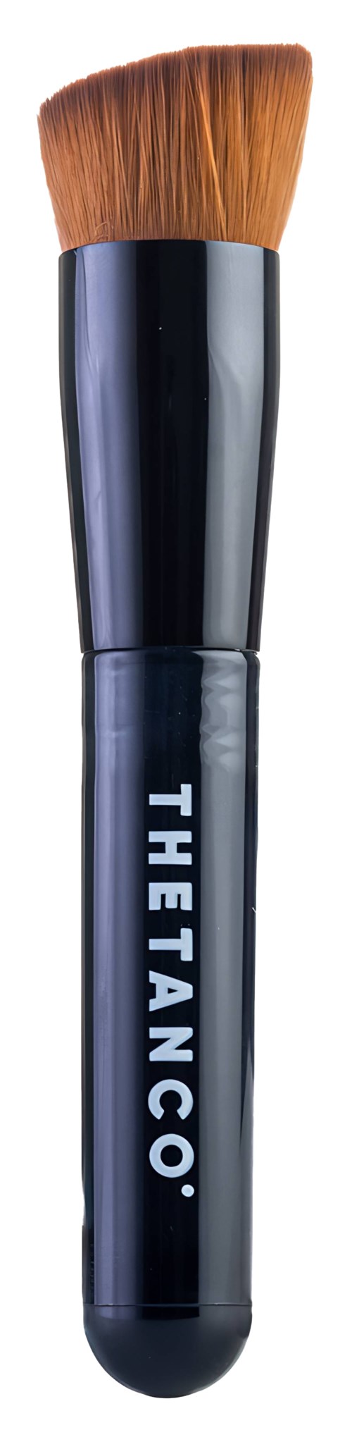 A makeup brush with brown bristles and a black handle with the word "THE TANOCO" written on it.