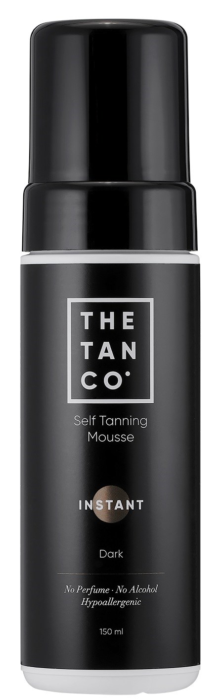 A black spray bottle with white text for self-tanning mousse, labeled 'INSTANT Dark' and 'No perfume, No alcohol.'