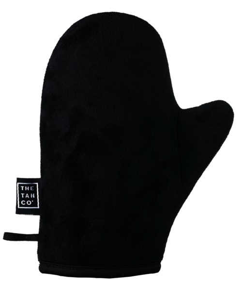 A black oven mitt with a label saying 'The Tain Co.' on it.