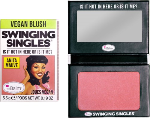 Vegan blush named Swinging Singles, by theBalm, features a woman with dark hair and bright lipstick. The product hints at being hot or not.