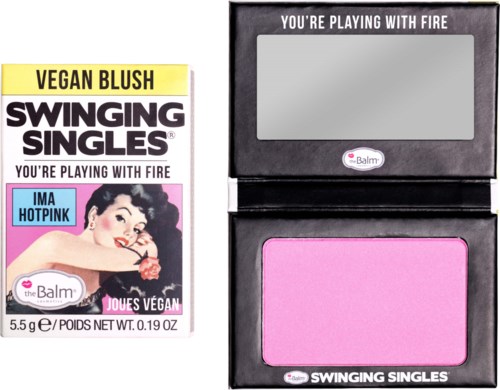 The image shows a makeup product with two shades, pink and gray, and a box with text about vegan blush and singles.