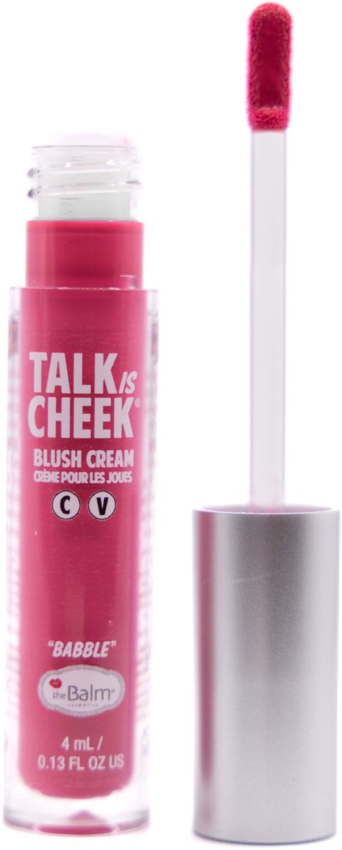 A lip gloss tube with a pink shade, label saying 'TALK IS CHEEK', and a wand applicator with pink gloss.