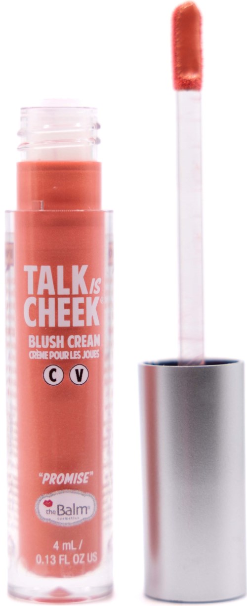 Lip gloss tube with a doe-foot applicator and pink-colored gloss.