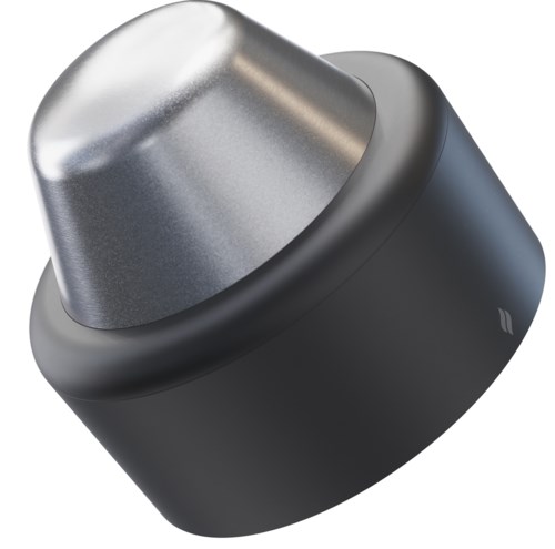 Een klein, rond, zwart en zilver apparaat, mogelijk een koffiecapsule of soortgelijke container.