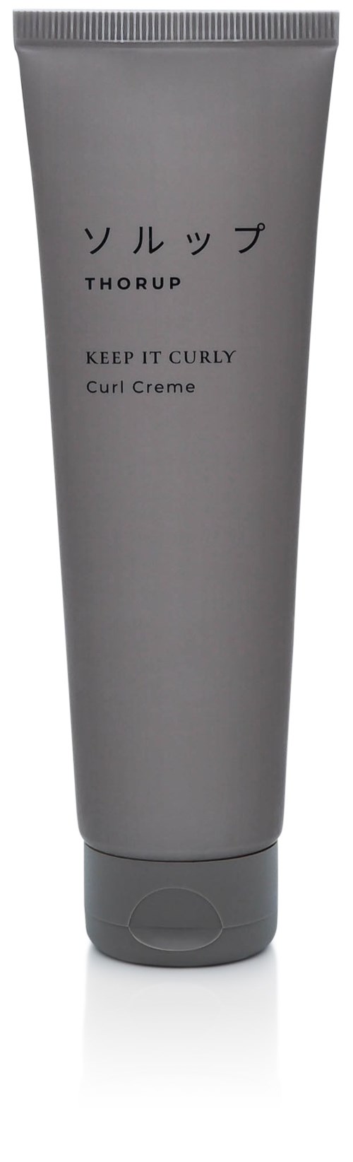 Gray tube container with Japanese text, brand name Thorup, and description for curly hair cream.