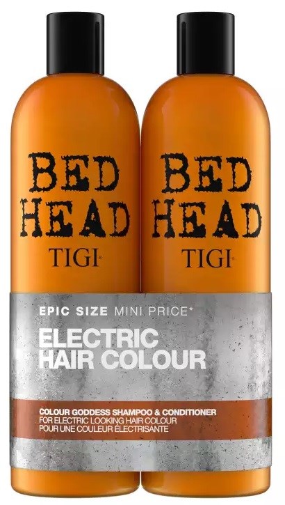 Two orange bottles labeled 'Bed Head' and 'Electric Hair Colour' contain shampoo and conditioner for hair coloring.