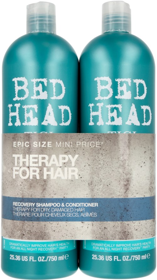 Two teal bottles labeled 'BED HEAD' with a label for hair therapy, shampoo, and conditioner. They are side by side.