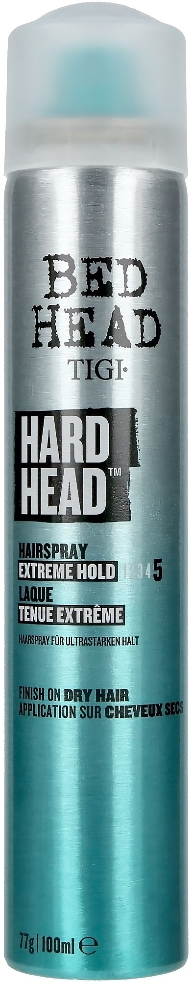 A silver bottle of Bed Head Hard Head hair spray with a light blue cap, labeled for extreme hold on dry hair.