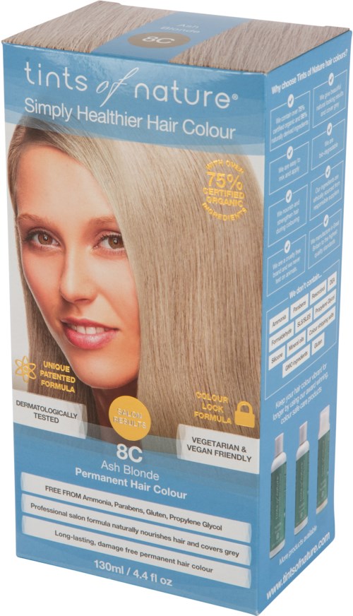 Blue hair dye box with a smiling woman showing blonde hair. Contains text about hair color and ingredients.