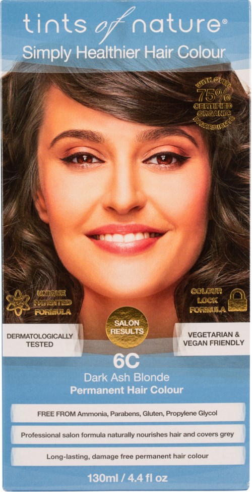 Packaging for hair dye called 'tints of nature' shows a smiling woman with dark ash blonde hair and various product benefits.