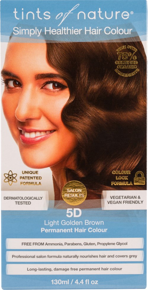 A hair dye box for 'tints of nature' with a smiling woman showing shiny light golden brown hair.
