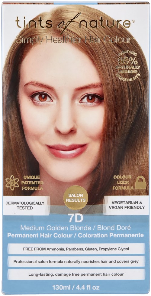 A woman with straight, brown hair and a slight smile, promoting hair dye for golden blonde color. The box highlights natural ingredients.