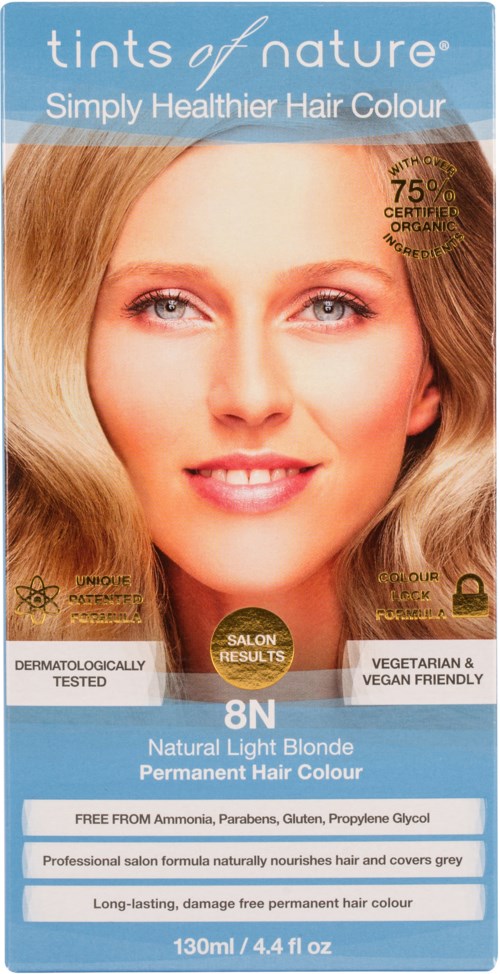 A blonde woman with a bright, happy smile, holding hair on both sides, with product details about hair color.