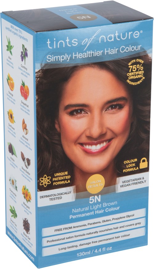 Hair dye box with a smiling woman, featuring natural ingredients and vegan, organic labels, emphasizing natural, healthy hair color.