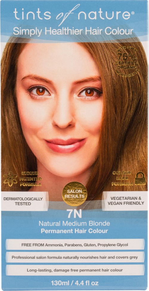 A woman with long, light brown or blonde hair and a bright, friendly smile on hair dye packaging.
