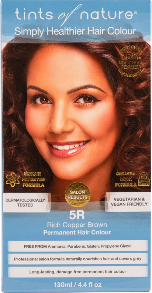 A box of hair dye named "tints of nature" for permanent hair color, with a smiling woman on the front and details about the product.