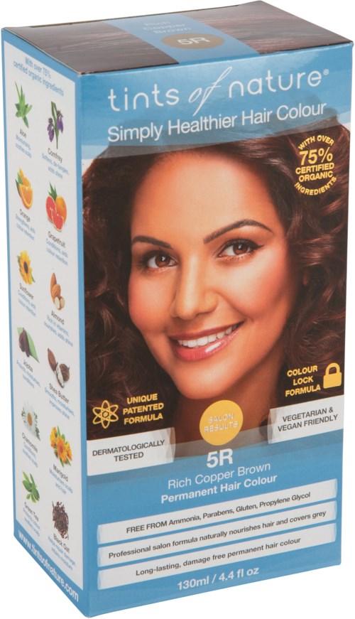 The box shows a smiling woman with shiny, brown hair. It is hair dye packaging for a natural, permanent hair color.