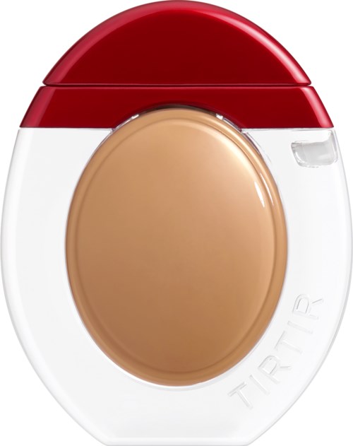 Rund beholder med rødt lokk og beige sentrum, merket TIR TAR, sannsynligvis et kosmetikk- eller makeupprodukt.
