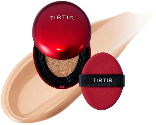 A red makeup compact, sponge, and brush with TIRTIR branding, placed on a light-colored surface.
