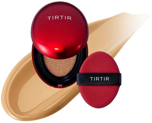 A red compact with a sponge applicator and makeup product inside, branded 'TIRTIR'. It is set on a beige background.