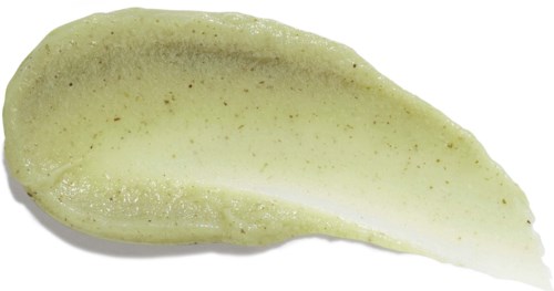 Green skincare cream or mask with small brown exfoliant particles, shaped like a spoonful.