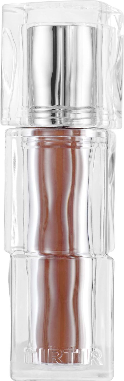 A clear glass perfume bottle with a metallic cap and a brown liquid inside.