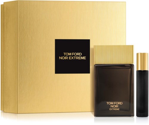 Een parfums set met een zwarte fles, gouden dop en een grote gouden doos met Tom Ford-naam.