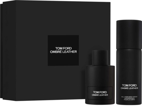 Een zwarte geschenkdoos met Tom Ford Ombre Leather parfum en body spray naast elkaar.