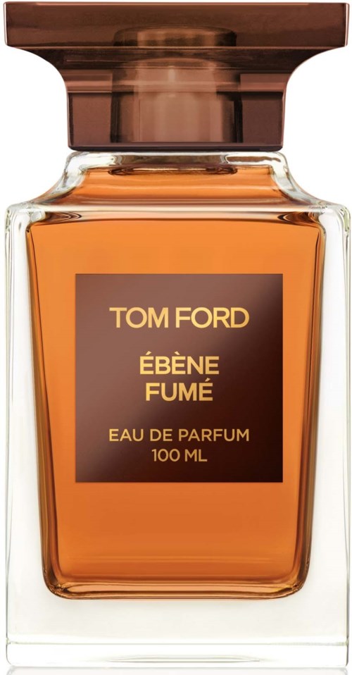 A perfume bottle with a brown cap, orange liquid inside, and a label that says Tom Ford Ébène Fumé.