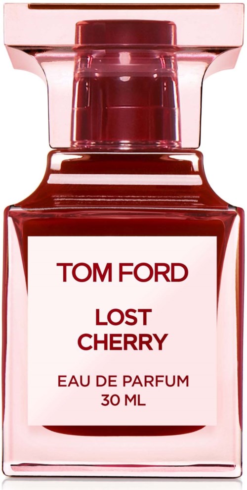 A perfume bottle labeled 'Tom Ford Lost Cherry,' 30ml, pinkish glass with a matching pink cap.