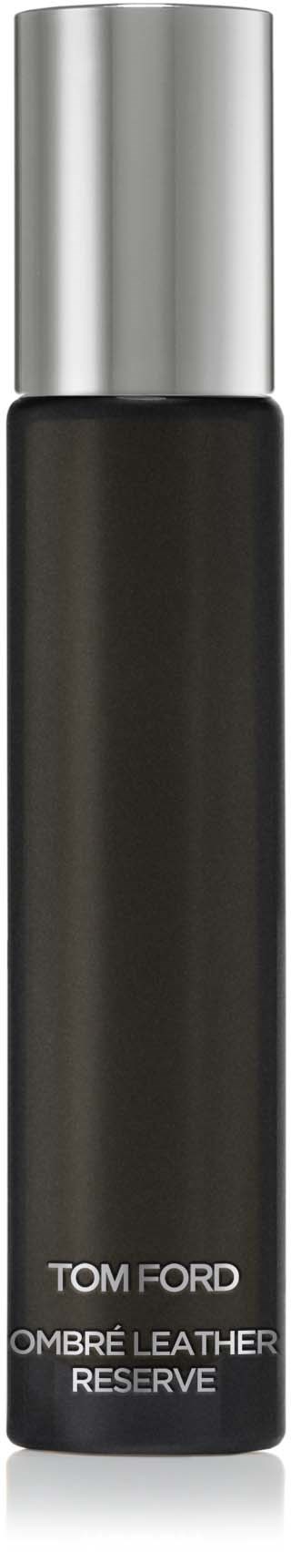 En lång, svart cylinderformad flaska med silverlock, märkt Tom Ford Ombre Leather Reserve.