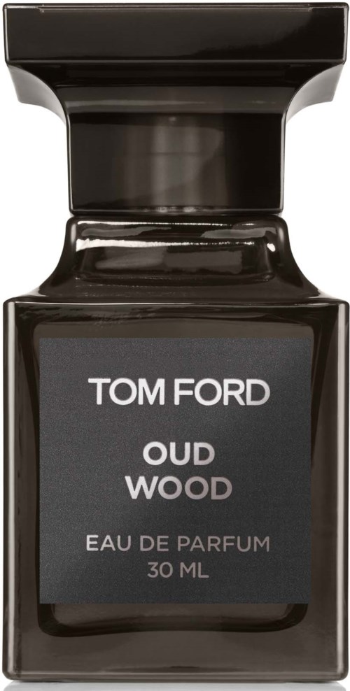 A black rectangular perfume bottle with a gray label. The label shows the text: TOM FORD, OUD WOOD, EAUD DPERFUM, 30 ML.