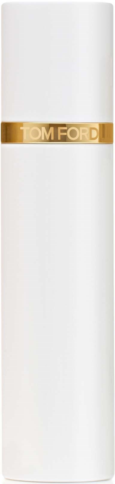 A white perfume bottle with a gold band that says 'TOM FORD'.
