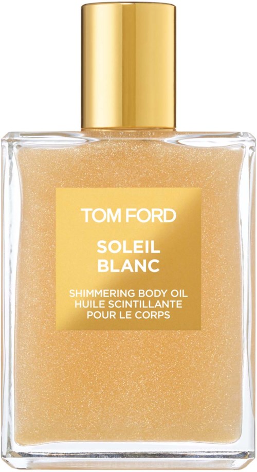 Een duidelijke fles met gouden dop, gelabeld Tom Ford Soleil Blanc, bevat glanzende lichaamsolie.