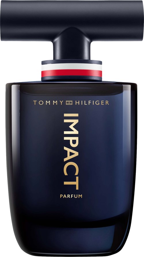 A navy blue perfume bottle with a black cap, red, white, and blue ring, and gold text.