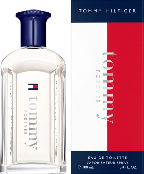 A bottle of Tommy Hilfiger perfume with a white and red packaging box next to it.