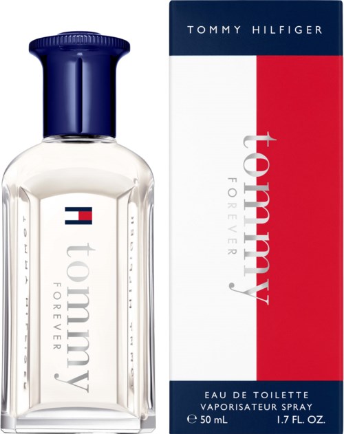 A clear perfume bottle with a blue cap, and a box with red, white, and blue colors, showing Tommy Hilfiger branding.