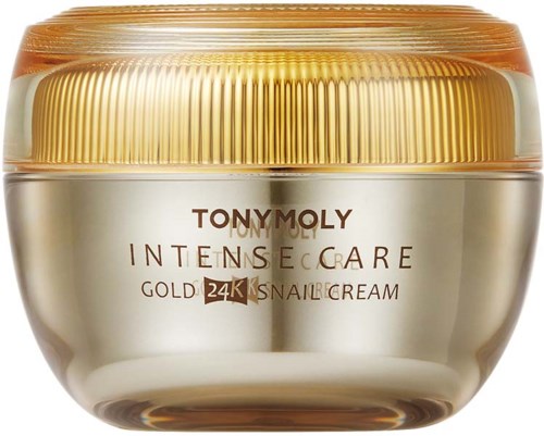 A round, gold-colored jar of Tony Moly skincare cream with a ridged lid. It is labeled 'Intense Care Gold 24K Snail Cream.'