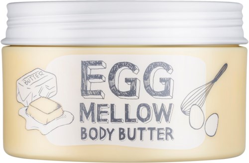Ein Glas mit eiförmiger Körperbutter mit Illustrationen von Butter, Eiern und einem Schneebesen auf dem Etikett.