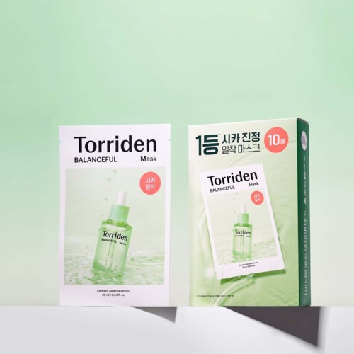 Torriden Balanceful maske emballasje og eske med produktbilde vises på en lys grønn bakgrunn.