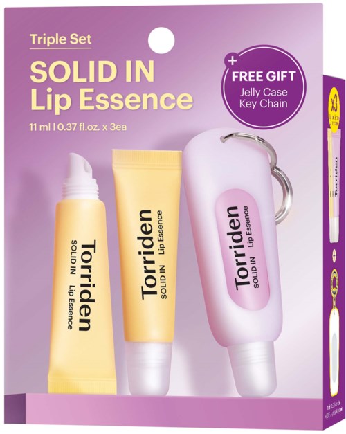 Et rosa og gult sett med Torriden leppepleieprodukter, inkludert en fast leppeessens, en tube og en leppebalm, med en gratis gave geléhåndtak nøkkelring.
