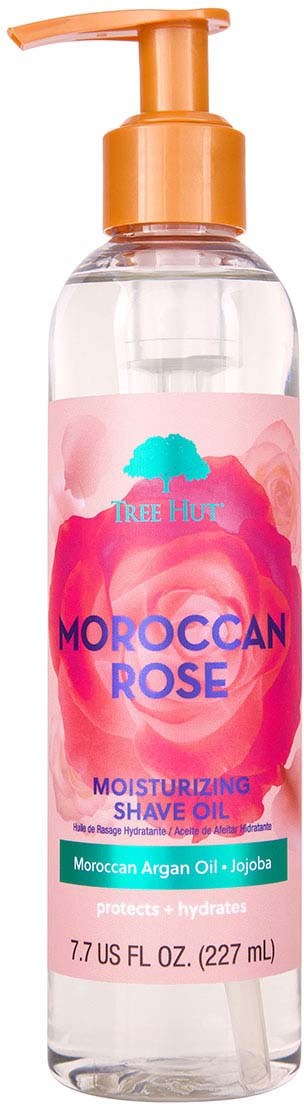 Eine klare Flasche mit pinkem und blauem Etikett, orangefarbener Pump, enthält feuchtigkeitsspendendes Rasieröl mit marokkanischem Arganöl und Jojoba.