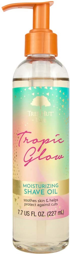 Klare Flasche mit Orangenpumpe, beschriftet 'Tropic Glow' feuchtigkeitsspendendes Rasieröl, schützt und beruhigt die Haut.