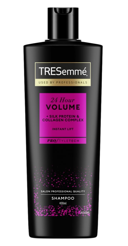 Black shampoo bottle with pink and white label, mainly text, promoting hair volume and care.