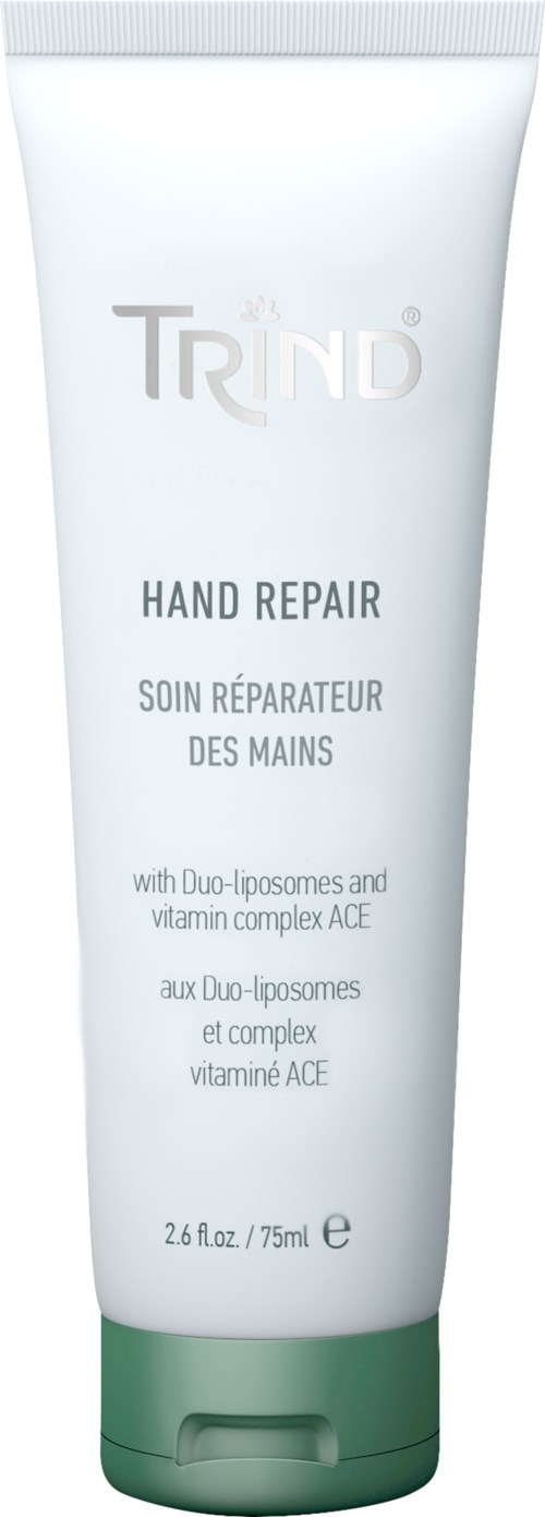 A white tube with green cap labeled "TRIND Hand Repair" for hand care, mentions duo-liposomes and vitamin complex.