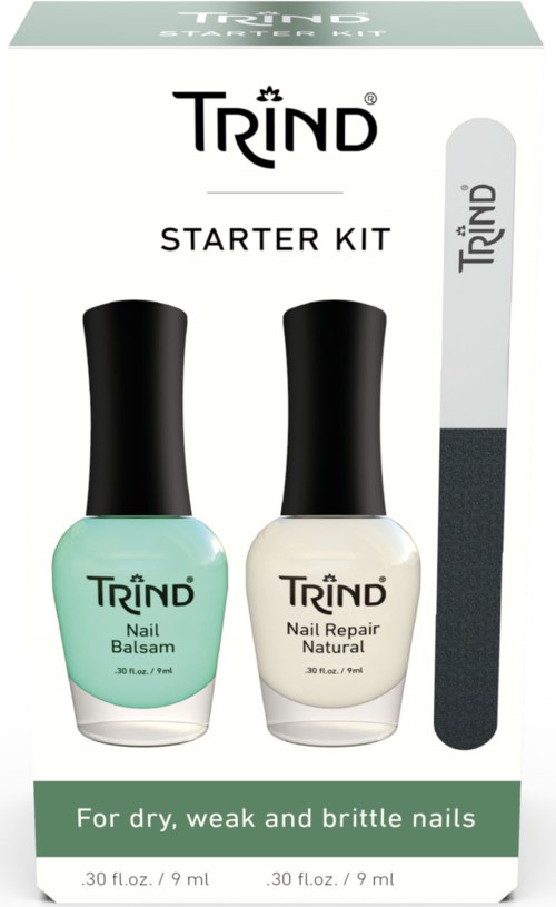 Two bottles of nail treatment products and a nail file are in a box for dry, weak nails.