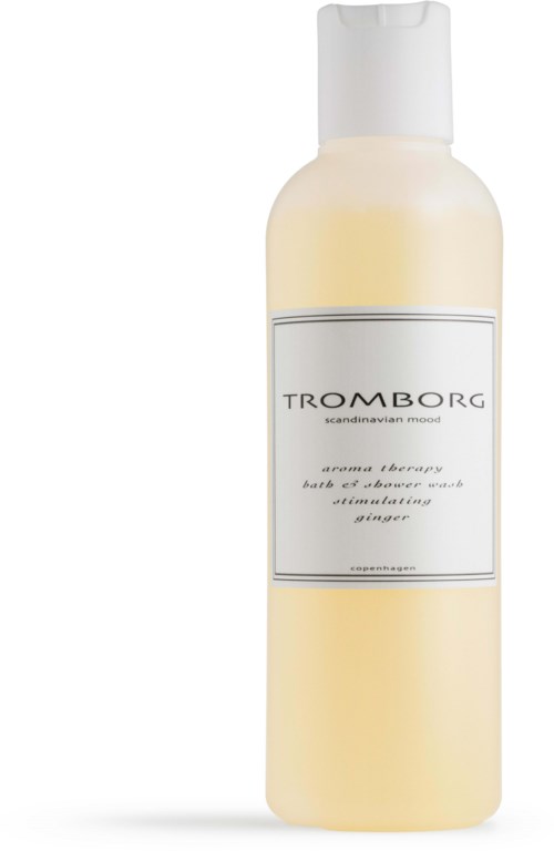 Eine weiße Flasche mit Etikett, enthält Aroma-Therapie Bad- und Duschwäsche mit Ingwerduft.