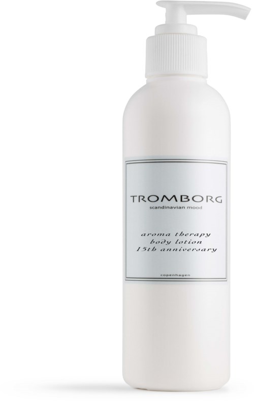 Vit lotionflaska med pump märkt 'Tromborg aroma therapy body lotion 15th anniversary.'